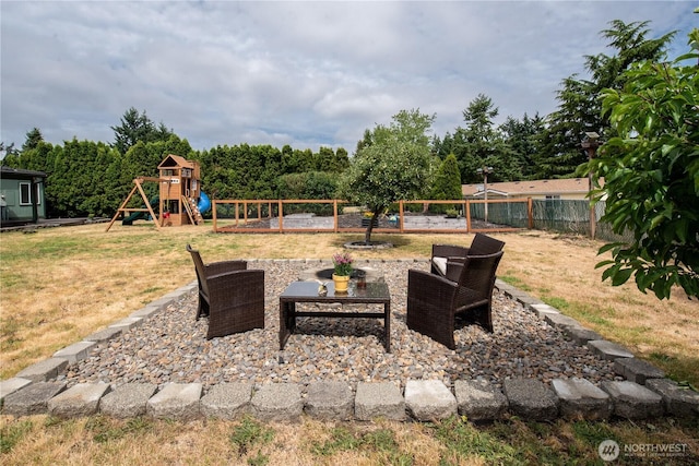 1729 154th St S, Spanaway, WA 98387 - fenced backyard with a playground