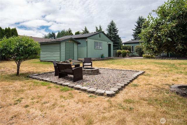 1729 154th St S, Spanaway, WA 98387 - view of grassy yard featuring an outdoor fire pit