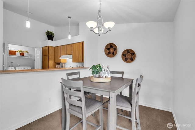 1780 W Sunn Fjord Ln Unit E306, Bremerton, WA 98312 - dining space featuring carpet, a chandelier, and high vaulted ceiling