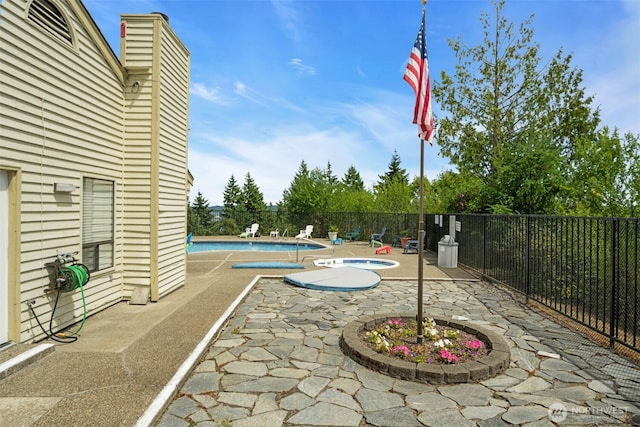 1780 W Sunn Fjord Ln Unit E306, Bremerton, WA 98312 - view of patio / terrace featuring a community pool