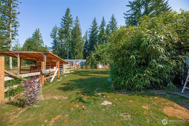 30124 Ramstad Rd, Arlington, WA 98223 - view of yard featuring an exterior structure and an outbuilding