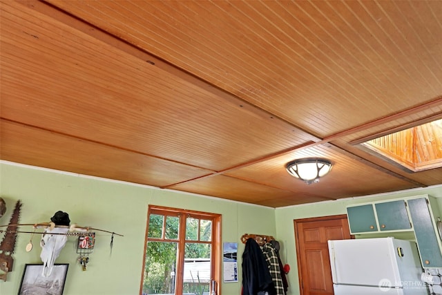 30124 Ramstad Rd, Arlington, WA 98223 - detailed view of freestanding refrigerator and wood ceiling