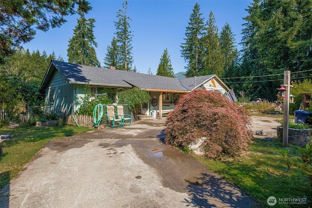 30124 Ramstad Rd, Arlington, WA 98223 - view of front of home with covered porch and a chimney