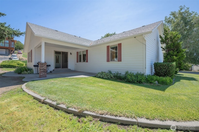 3716 Knowles Rd, Wenatchee, WA 98801 - rear view of house with a patio and a lawn