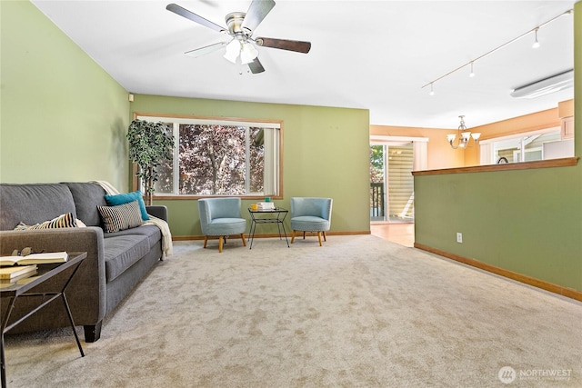 639 W Horton Way Unit 228, Bellingham, WA 98226 - carpeted living room featuring track lighting, a chandelier, and ceiling fan