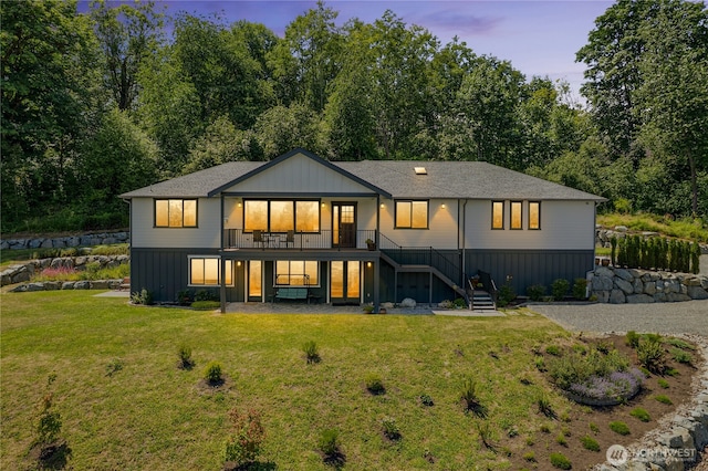 13830 Old Snohomish Monroe Rd, Snohomish, WA 98290 - back of house at dusk featuring stairs and a yard