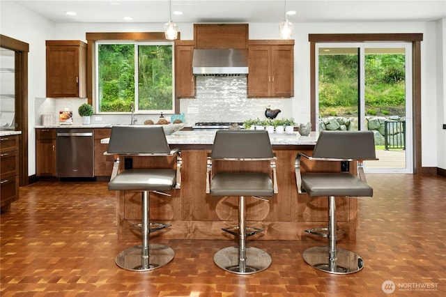 13830 Old Snohomish Monroe Rd, Snohomish, WA 98290 - kitchen featuring stainless steel dishwasher, wall chimney exhaust hood, backsplash, a kitchen bar, and recessed lighting
