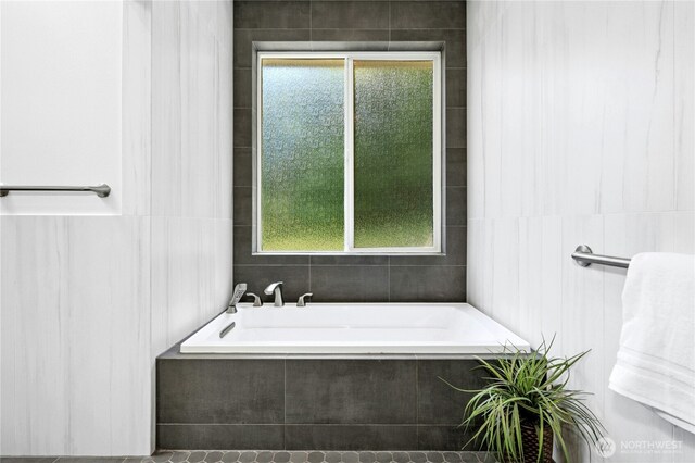 13830 Old Snohomish Monroe Rd, Snohomish, WA 98290 - bathroom featuring tile walls and a garden tub