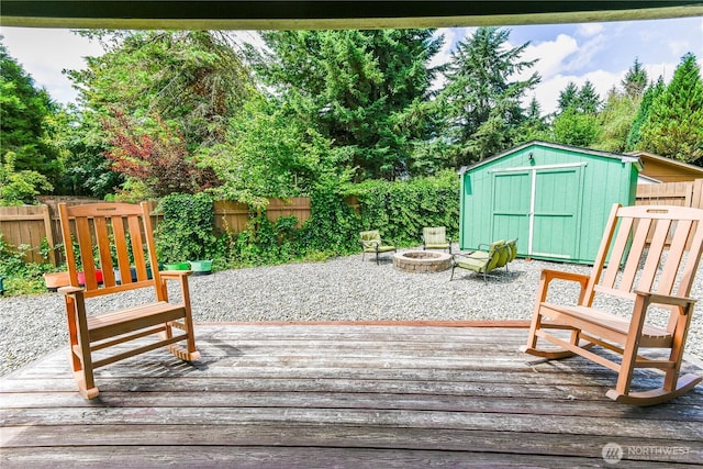 4508 36th Ct SE, Lacey, WA 98503 - wooden terrace with a fire pit and a shed