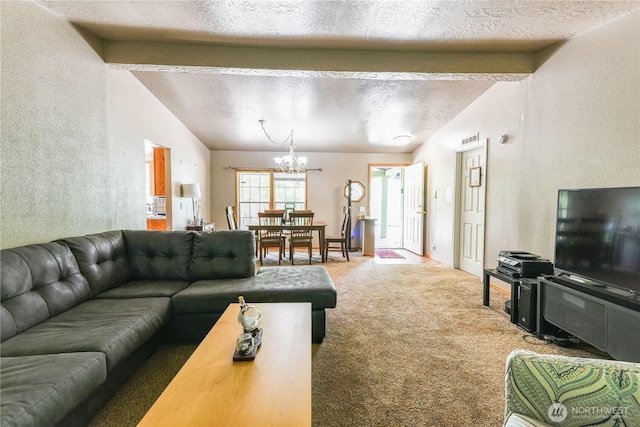 4508 36th Ct SE, Lacey, WA 98503 - carpeted living room featuring a chandelier and a textured wall