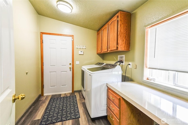 4508 36th Ct SE, Lacey, WA 98503 - washroom featuring cabinet space, washing machine and dryer, dark wood-style flooring, and a textured ceiling