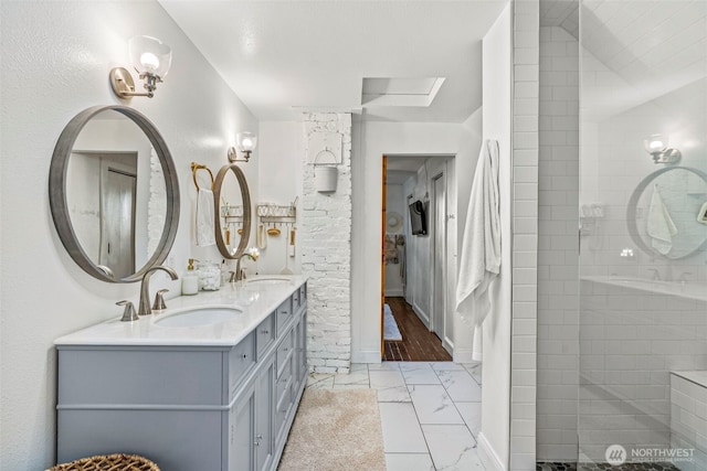 505 NE Jefferson, Chehalis, WA 98532 - bathroom with double vanity, a tile shower, and marble look tile flooring