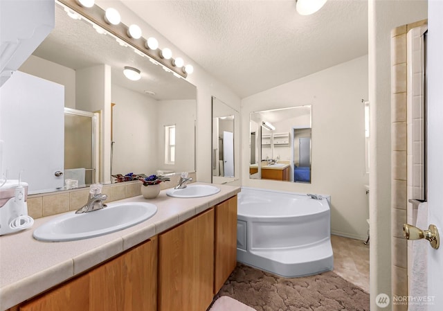 8654 Valley View Rd, Custer, WA 98240 - full bath with double vanity, a garden tub, an enclosed shower, and a textured ceiling