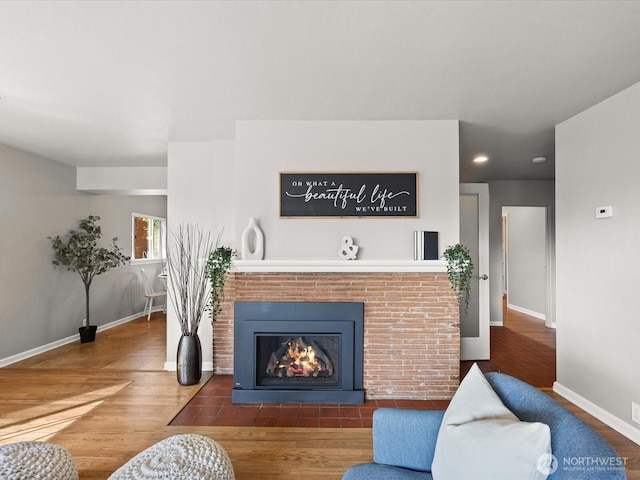 13514 3rd Ave NE, Seattle, WA 98125 - living room featuring wood finished floors, recessed lighting, and a fireplace