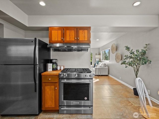 13514 3rd Ave NE, Seattle, WA 98125 - kitchen with stainless steel appliances, ventilation hood, recessed lighting, and brown cabinets