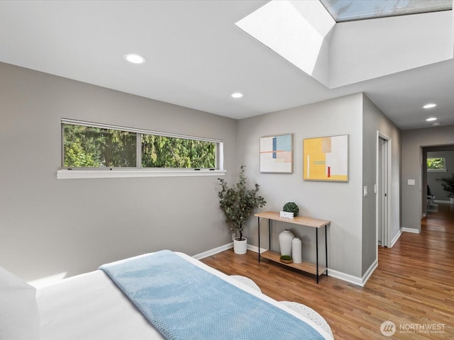 13514 3rd Ave NE, Seattle, WA 98125 - bedroom with wood finished floors, recessed lighting, and a skylight