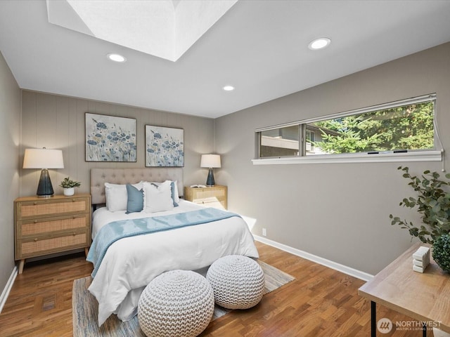 13514 3rd Ave NE, Seattle, WA 98125 - bedroom featuring recessed lighting, wood finished floors, and a skylight
