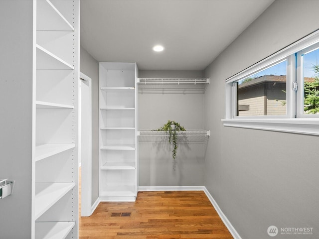 13514 3rd Ave NE, Seattle, WA 98125 - walk in closet with wood finished floors