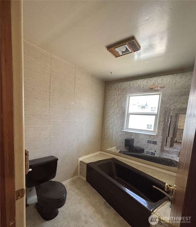 214 N 2nd St, Dayton, WA 99328 - bathroom with a bath and tile patterned floors