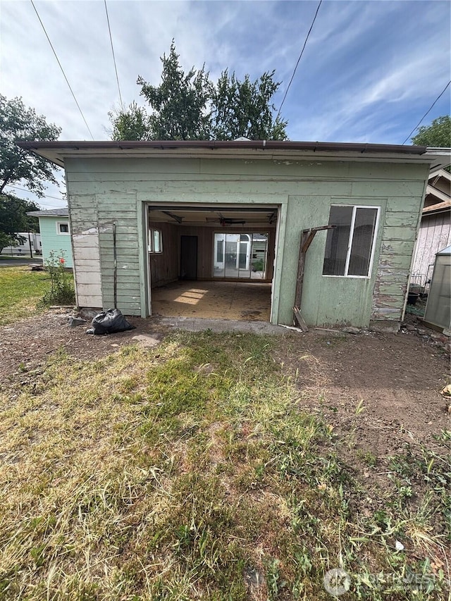 214 N 2nd St, Dayton, WA 99328 - rear view of house with a garage