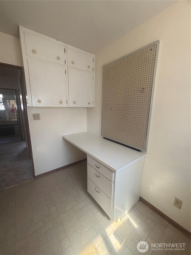 214 N 2nd St, Dayton, WA 99328 - unfurnished office with baseboards and built in study area