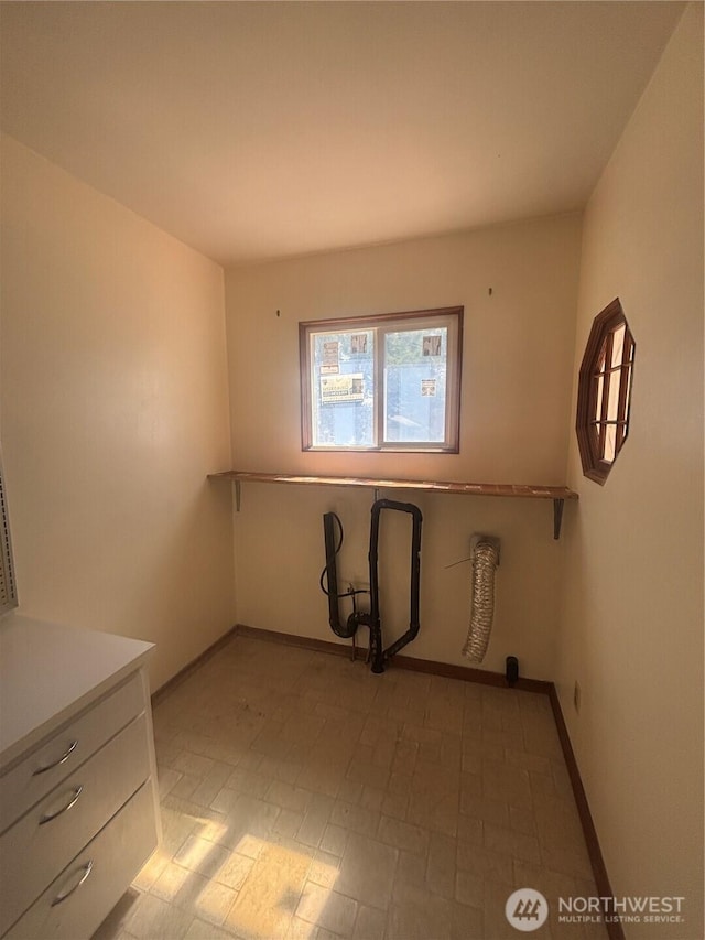 214 N 2nd St, Dayton, WA 99328 - empty room with baseboards and light flooring