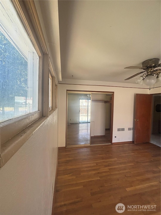 214 N 2nd St, Dayton, WA 99328 - empty room with wood finished floors and a ceiling fan