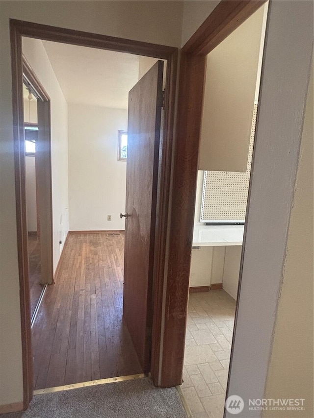 214 N 2nd St, Dayton, WA 99328 - hallway with wood-type flooring and baseboards