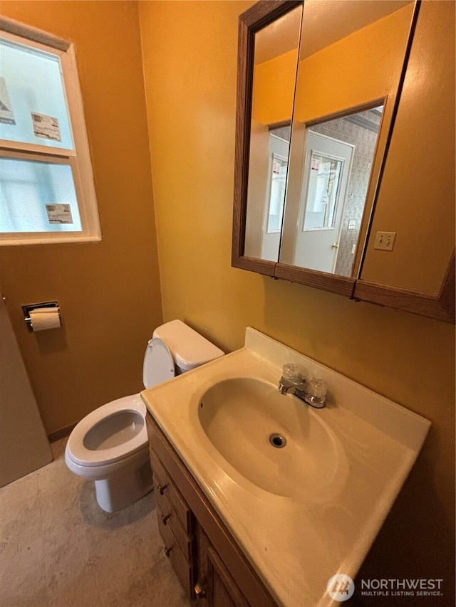 214 N 2nd St, Dayton, WA 99328 - half bathroom featuring toilet and vanity