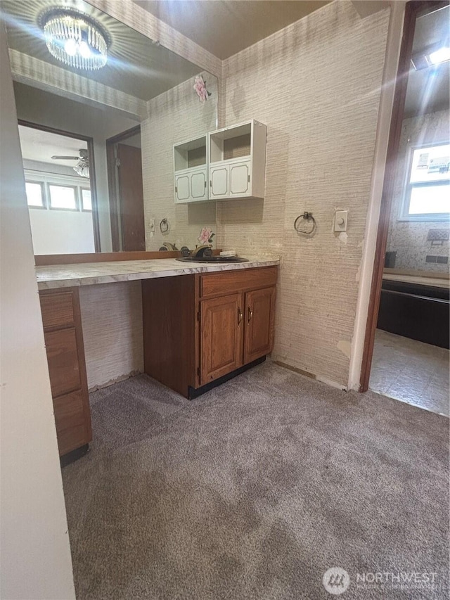 214 N 2nd St, Dayton, WA 99328 - bathroom with carpet flooring, vanity, healthy amount of natural light, and ceiling fan