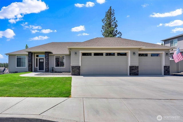 9511 W Floyd Dr, Cheney, WA 99004 - prairie-style home featuring an attached garage, stone siding, and driveway