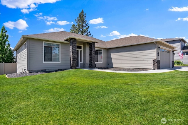 9511 W Floyd Dr, Cheney, WA 99004 - prairie-style house featuring a garage, stone siding, concrete driveway, and roof with shingles