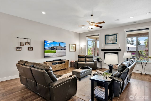 9511 W Floyd Dr, Cheney, WA 99004 - living area with plenty of natural light, ceiling fan, wood finished floors, and recessed lighting