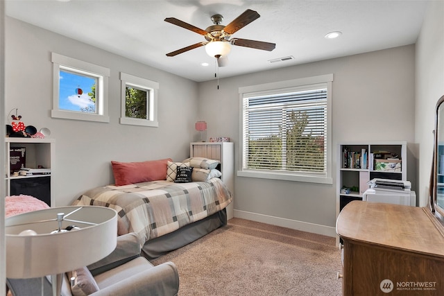 9511 W Floyd Dr, Cheney, WA 99004 - bedroom with light colored carpet, recessed lighting, and ceiling fan