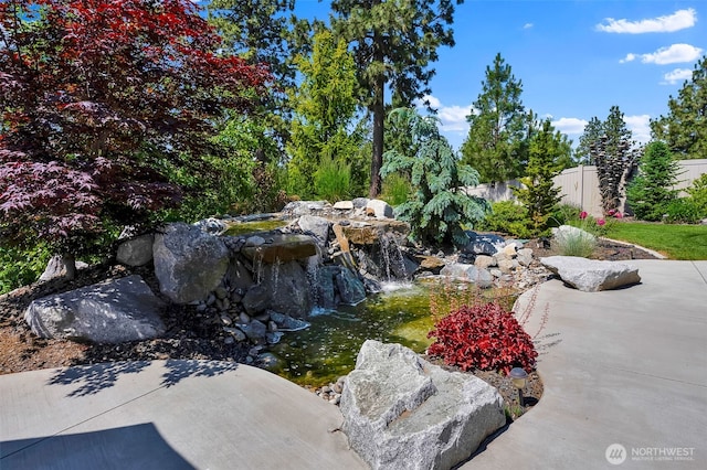 9511 W Floyd Dr, Cheney, WA 99004 - view of yard featuring a garden pond and a patio area