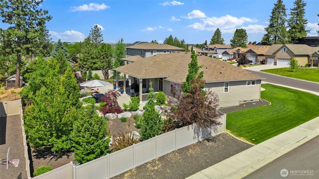 9511 W Floyd Dr, Cheney, WA 99004 - view of side of property featuring a residential view and roof with shingles