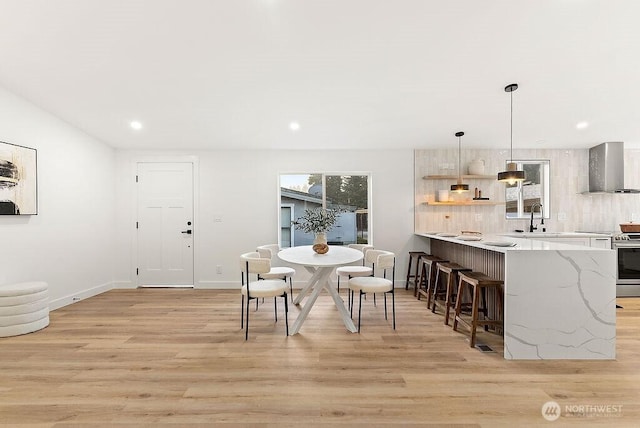 2500 S 370th Unit 227, Federal Way, WA 98003 - dining area with light wood-type flooring and recessed lighting