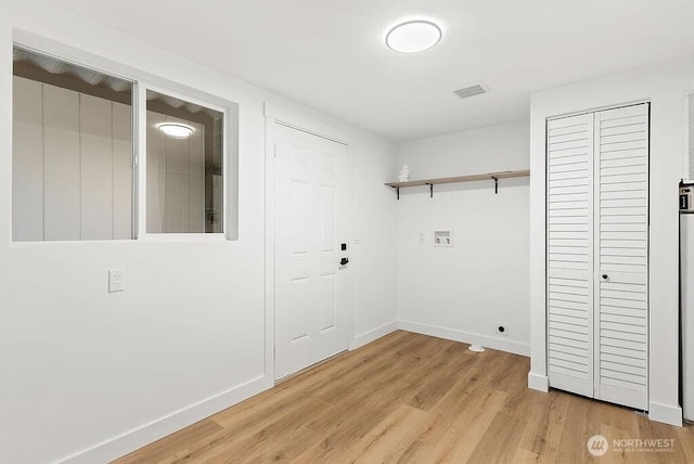 2500 S 370th Unit 227, Federal Way, WA 98003 - laundry area featuring hookup for a washing machine, light wood-type flooring, and hookup for an electric dryer