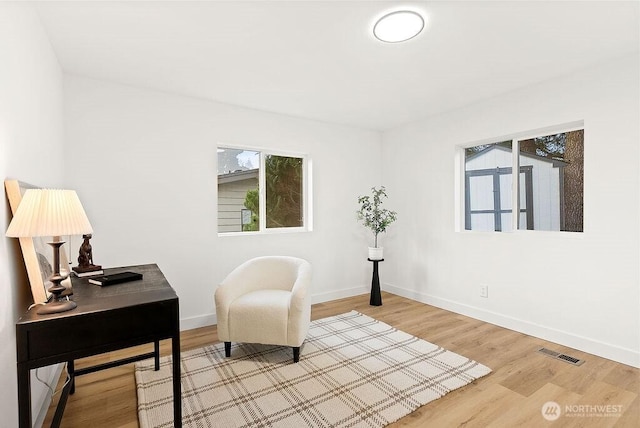 2500 S 370th Unit 227, Federal Way, WA 98003 - living area featuring wood finished floors and an office area