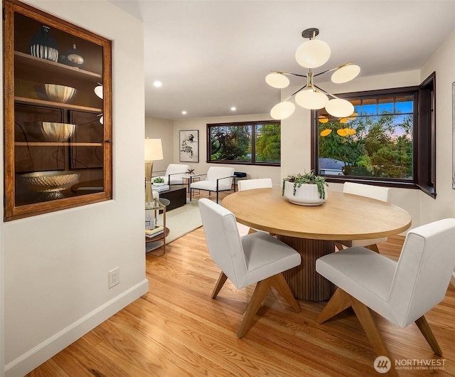 5244 Pullman Ave NE, Seattle, WA 98105 - dining area with light wood-style floors, recessed lighting, and a chandelier