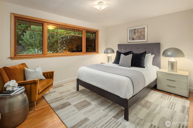 5244 Pullman Ave NE, Seattle, WA 98105 - bedroom featuring wood finished floors and baseboards