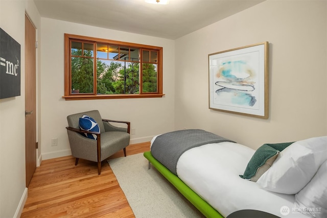 5244 Pullman Ave NE, Seattle, WA 98105 - bedroom featuring light wood-style flooring and baseboards