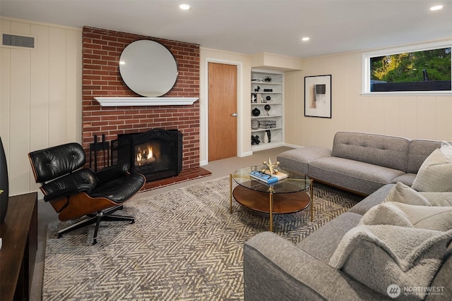 5244 Pullman Ave NE, Seattle, WA 98105 - living area with carpet, a fireplace, built in shelves, and recessed lighting