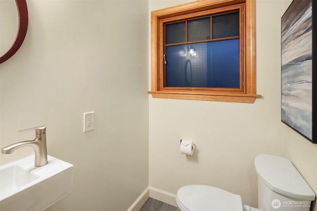 5244 Pullman Ave NE, Seattle, WA 98105 - half bath featuring toilet and baseboards