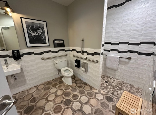 1350 W Woodin Ave Unit Ede2, Chelan, WA 98816 - full bathroom featuring tile walls, a tile shower, tile patterned floors, and wainscoting
