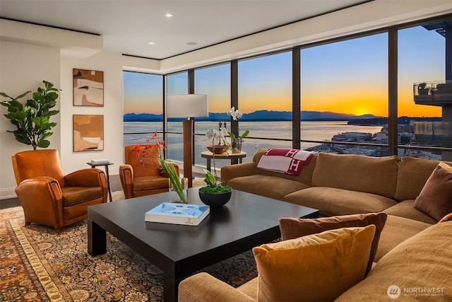 99 Union St Unit 1601, Seattle, WA 98101 - living room featuring a water and mountain view, wood finished floors, and recessed lighting