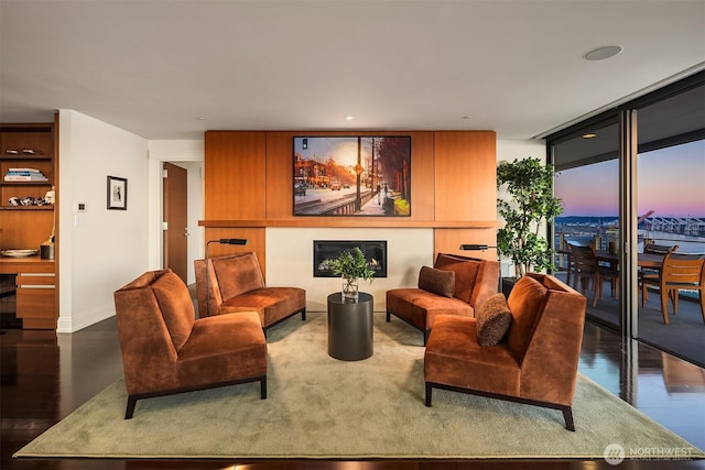 99 Union St Unit 1601, Seattle, WA 98101 - living room featuring baseboards and floor to ceiling windows