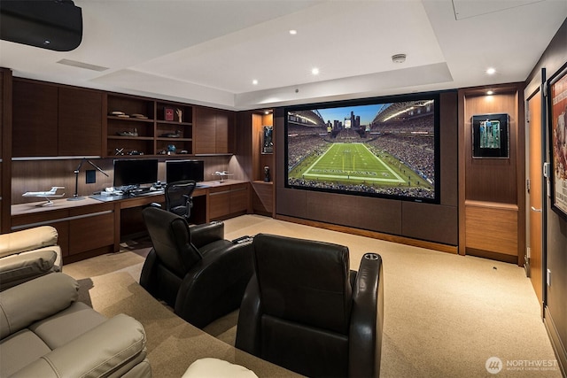 99 Union St Unit 1601, Seattle, WA 98101 - cinema featuring a tray ceiling, built in desk, light carpet, and recessed lighting