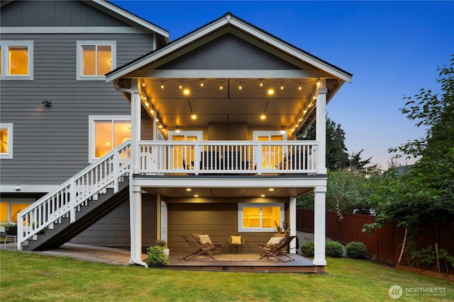 230 155th Pl SE, Bothell, WA 98012 - back of house at dusk with a deck and stairway