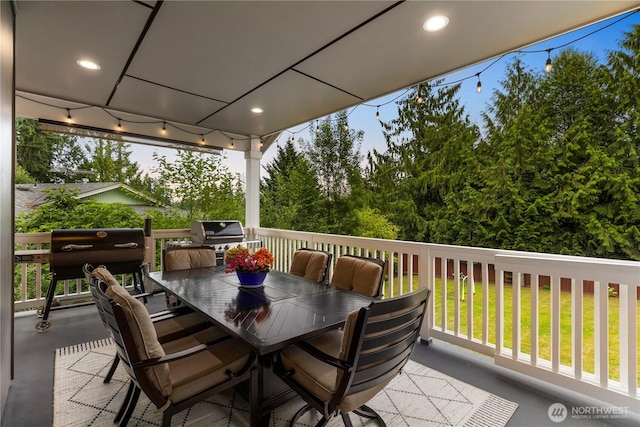 230 155th Pl SE, Bothell, WA 98012 - view of patio with grilling area, outdoor dining area, and view of wooded area